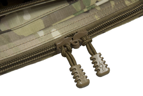 Close up of locking zippers on main weapon compartment.