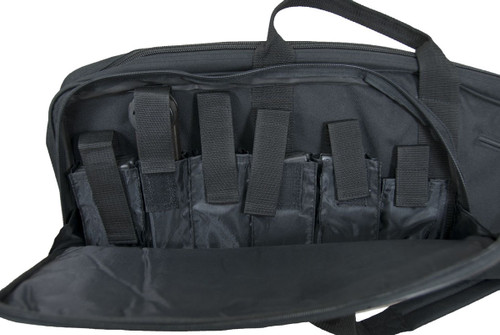 Scoped Carbine Case in black front pocket opened showing 6 double stack mag pouches.