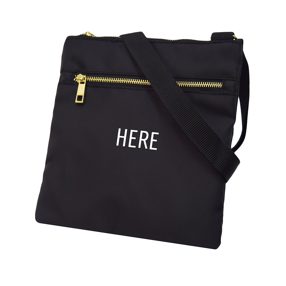Black Crossbody Bag shown with monogram placement on front pocket.