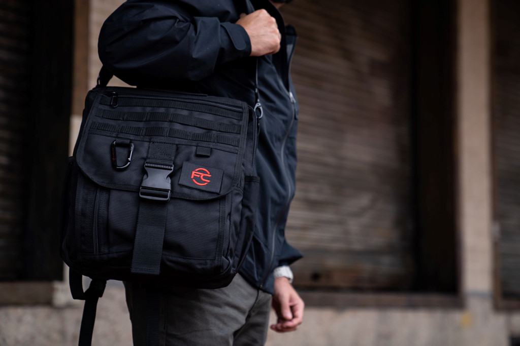 Business Backpack worn on shoulder.