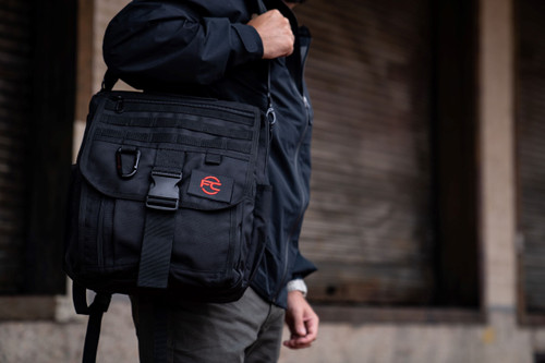 Business Backpack worn on shoulder.