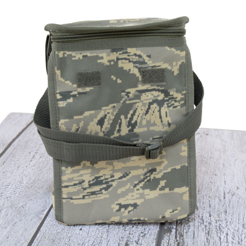 Lunch Bag in ABU shown with zippered top and adjustable strap to carry by hand or over the shoulder.