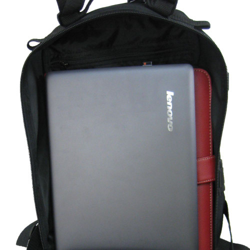 Presidio Tactical Assault Pack in black with large back pocket opened with laptop inside showing plenty of room for a tablet, laptop, folders, etc.