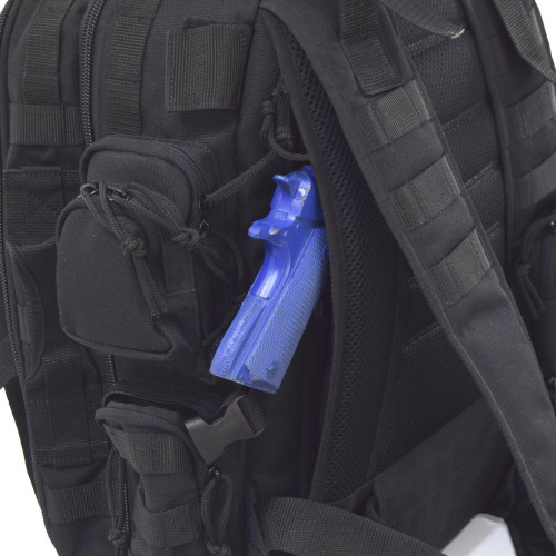 Hidden “pass through” backside pocket with zippers on both sides can be used as a secure conceal carry compartment.  Shown with blue gun inside Brazos Concealed Carry Backpack in black.