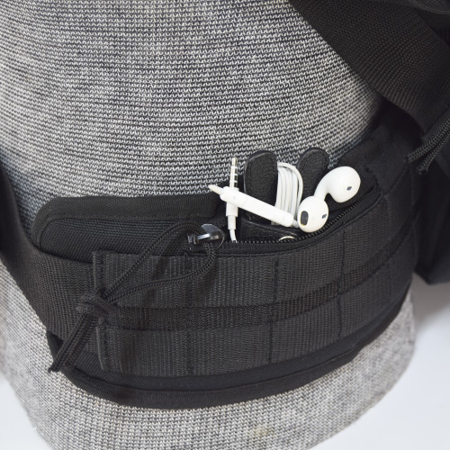 Padded, heavy duty, removable waist strap with two small zipper pockets for keys, wallet, and mobile phone, etc.  Shown with ear buds inside on Brazos Concealed Carry Backpack in black.