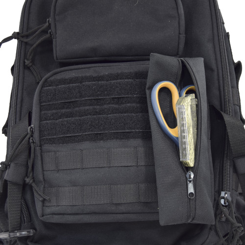 MOLLE on front for clip on items and pouches, shown with scissors inside attached pouch on Brazos Concealed Carry Backpack in black.