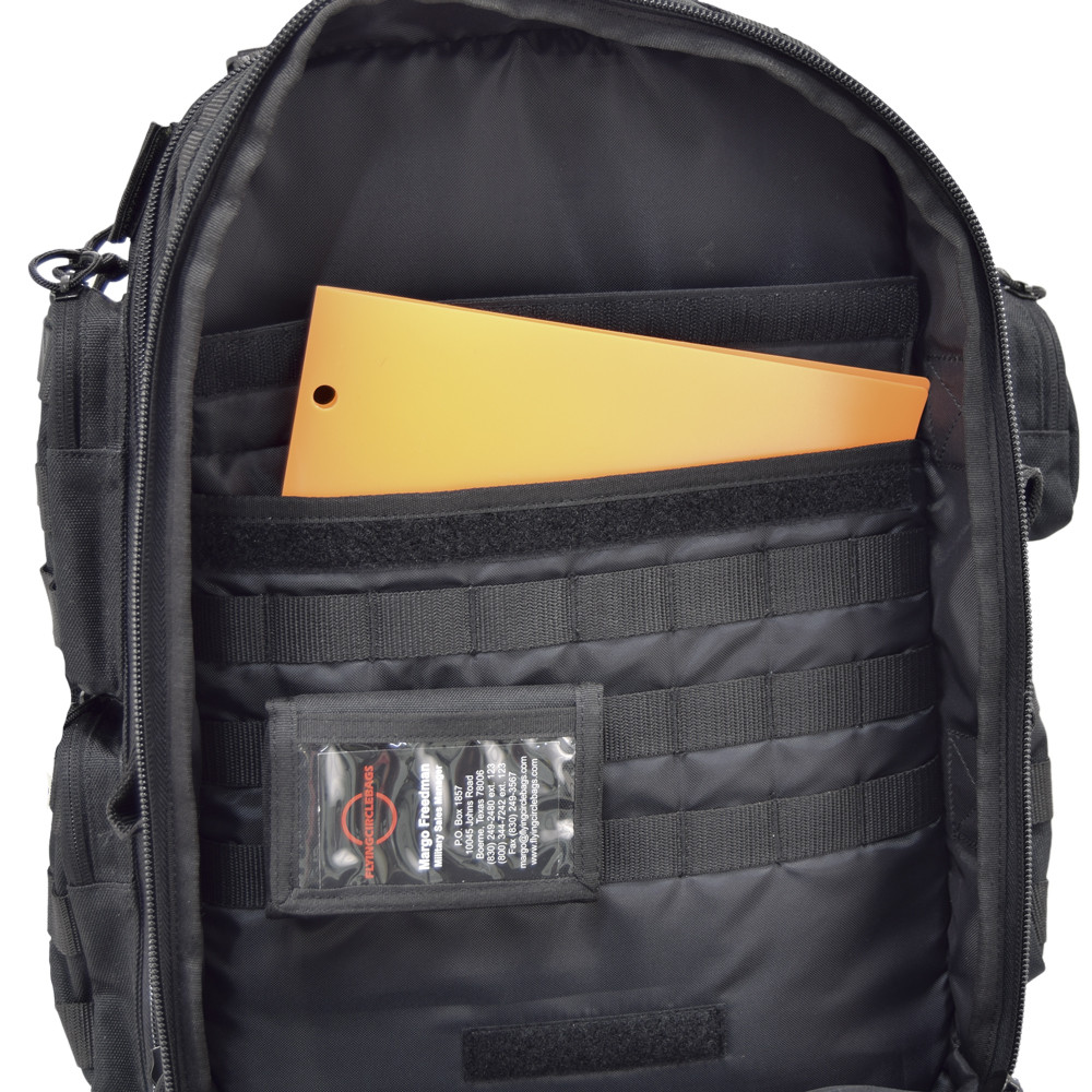 One of the main interior pockets with slip-in pocket, MOLLE webbing, and ID card holder, shown inside Brazos Concealed Carry Backpack in black.