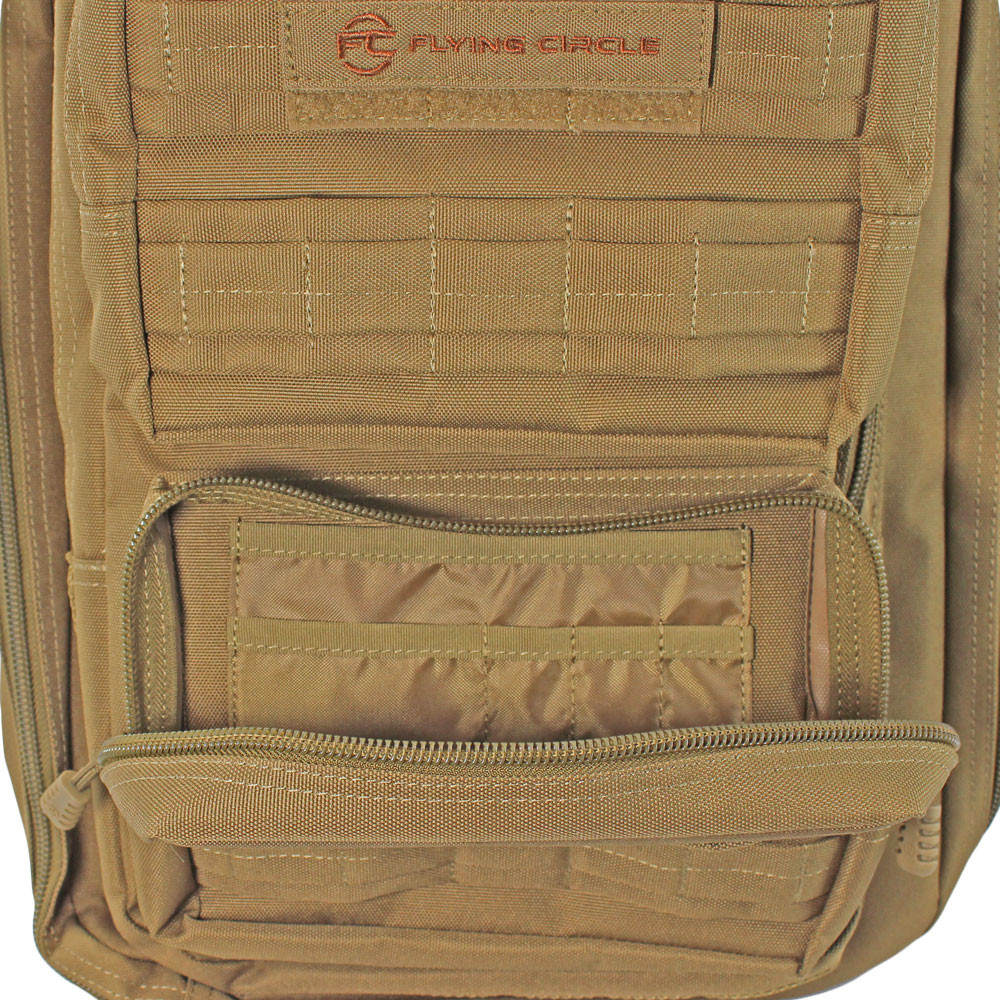 Bottom front pocket on coyote brown Midland Backpack with organizer panel inside.