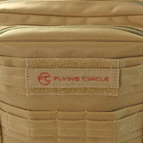 Removable Flying Circle patch on top front pocket of coyote brown Midland Backpack.