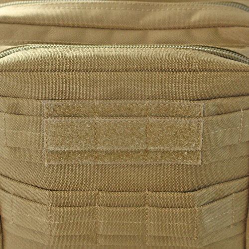 Loop backing on top front pocket for name tape on coyote brown Midland Backpack.