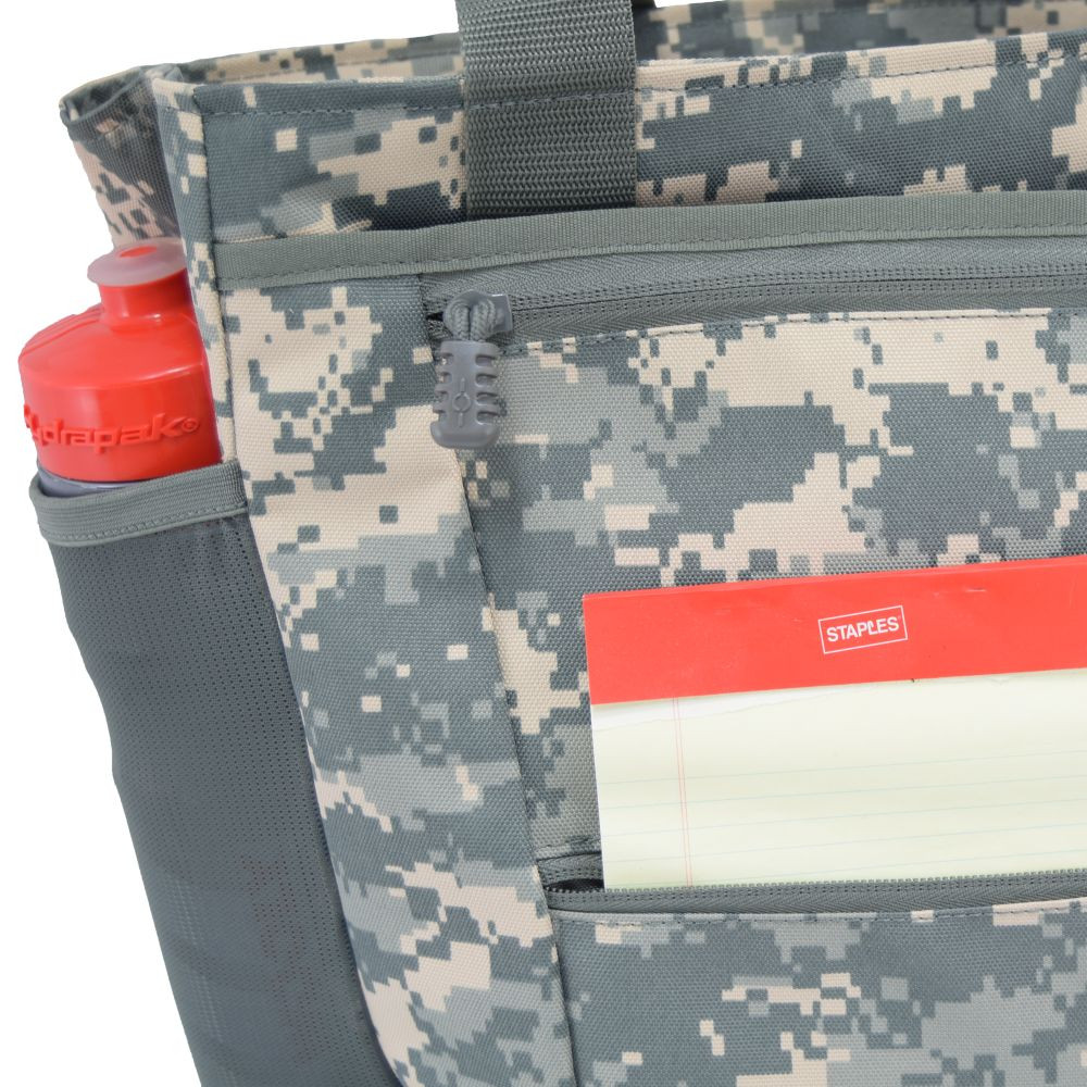 Close up of side water bottle pocket and notebook inside front pocket.