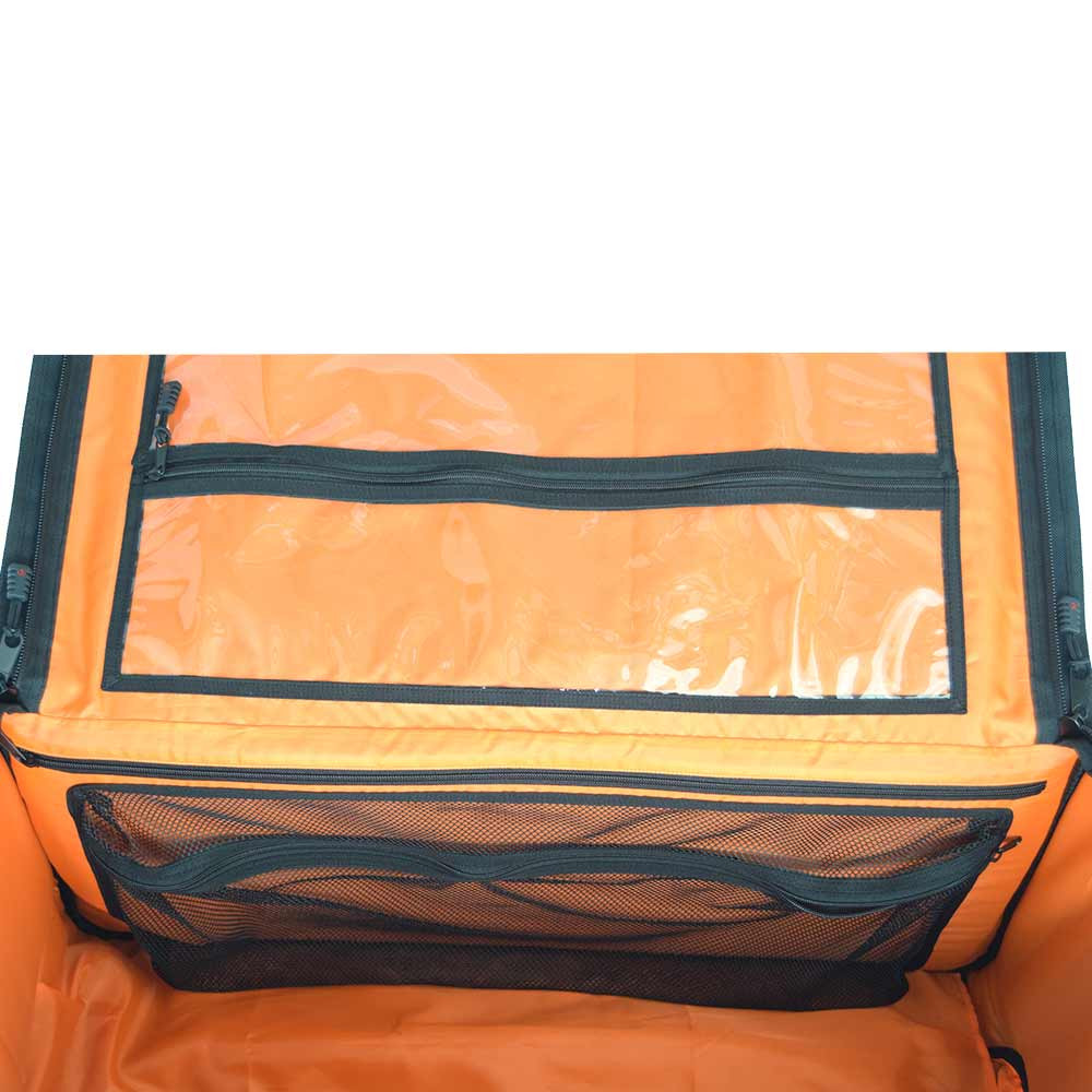 Close up of black Buffalo Duffel interior showing three large interior pockets - 2 clear vinyl pockets & 1 mesh pocket.