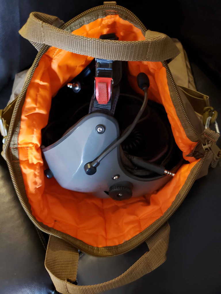 Helmet shown inside open Deluxe Helmet Bag.