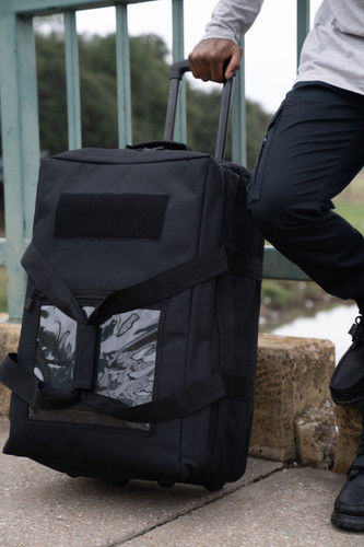 Mini Buffalo Rolling Duffel in Black upright.