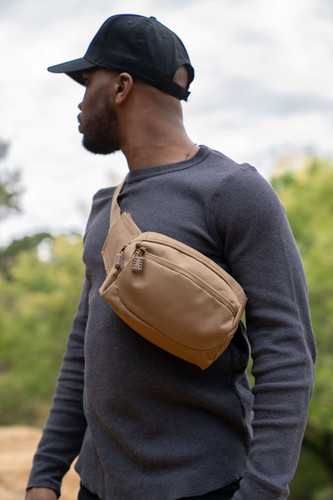 EDC Sling Bag & Waist Pack in Coyote worn across chest.