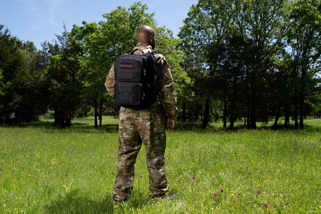 Black Midland Backpack worn with MultiCam® uniform.