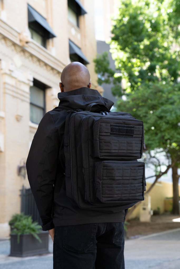 Black Midland Backpack worn on street.